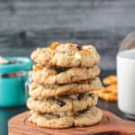 Stack of five vegan chocolate chip cookies with pretzels.