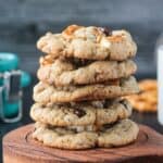 Stack of five vegan chocolate chip cookies with pretzels.