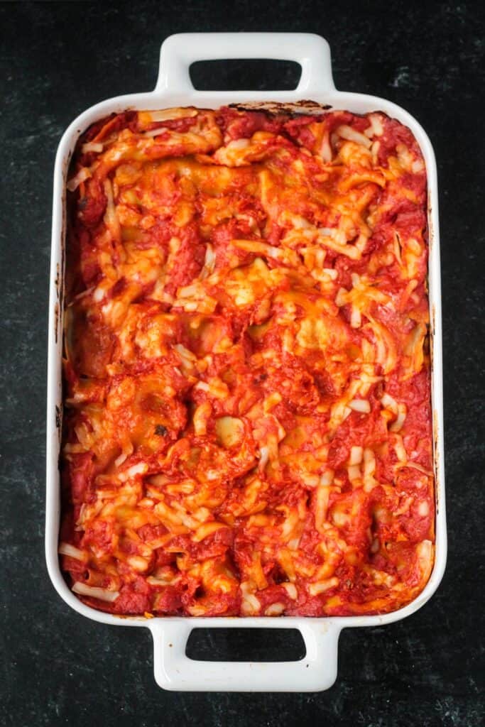 Baked vegetable lasagna in a baking dish.