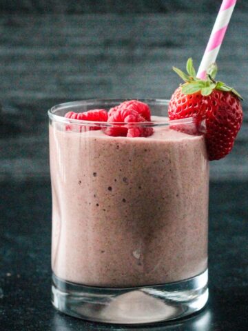 This Mixed Berry Smoothie is a deliciously sweet, creamy breakfast or snack. It has a hint of chocolate that complements the berries perfectly. Grab a straw and get sipping!