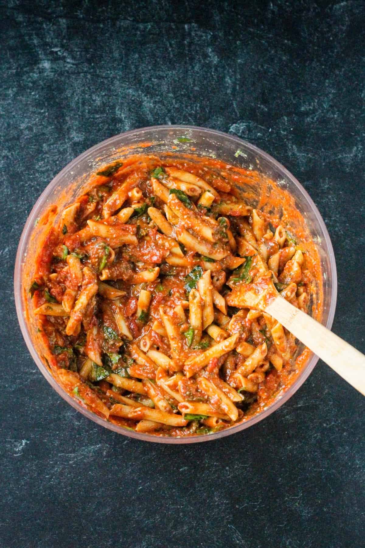 Tomato sauce mixed in to the pasta mixture.