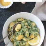 Pan-fried gnocchi in creamy spinach sauce.