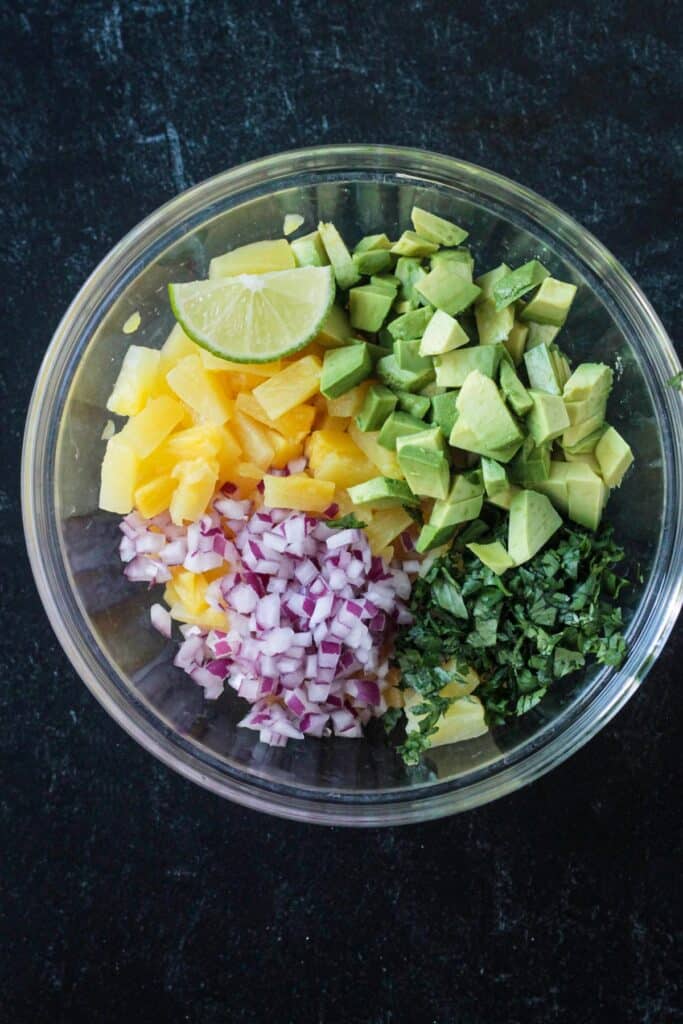 Diced ingredients arranged in a mixing bowl.