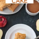 Cake slice on a plate next to a cup of coffee and a serving plate of more cake.