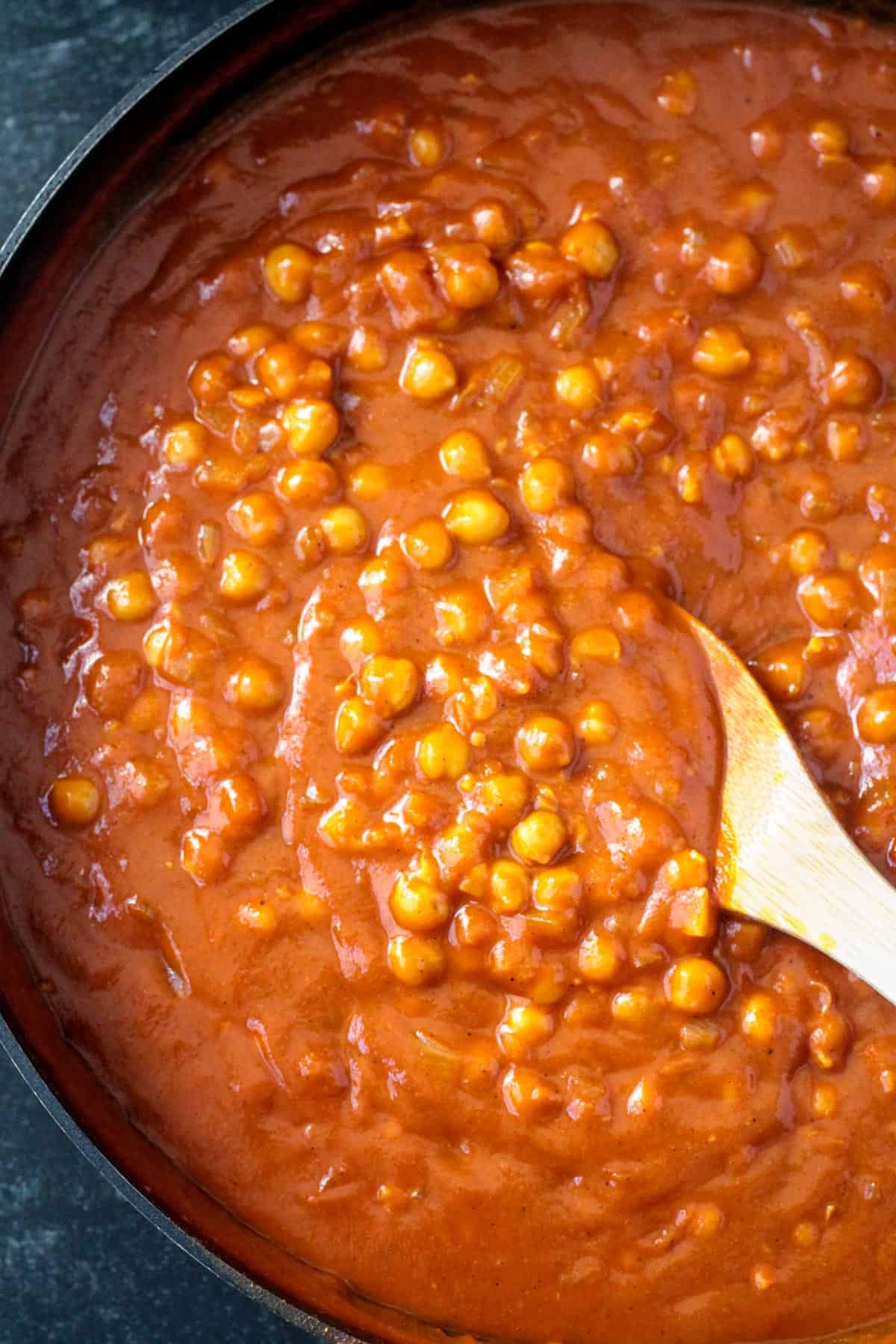 Close up of finished chickpeas in tikka masala sauce.