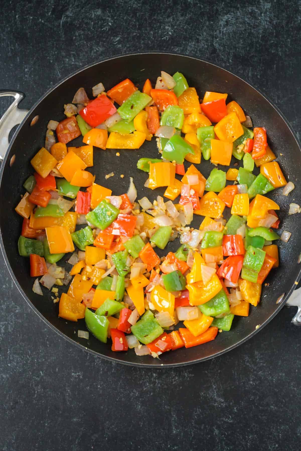 Sautéed bell peppers and onions.