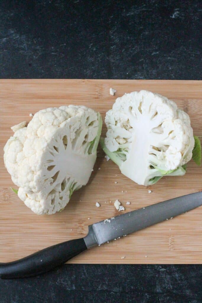 A head of cauliflower cut in half.