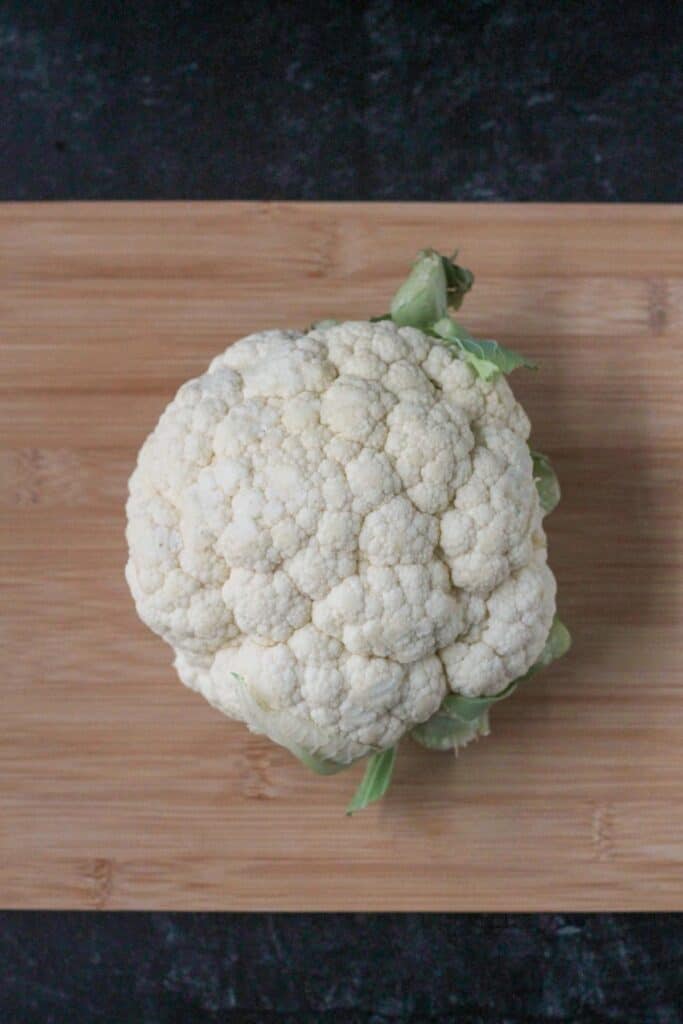 One whole raw cauliflower.