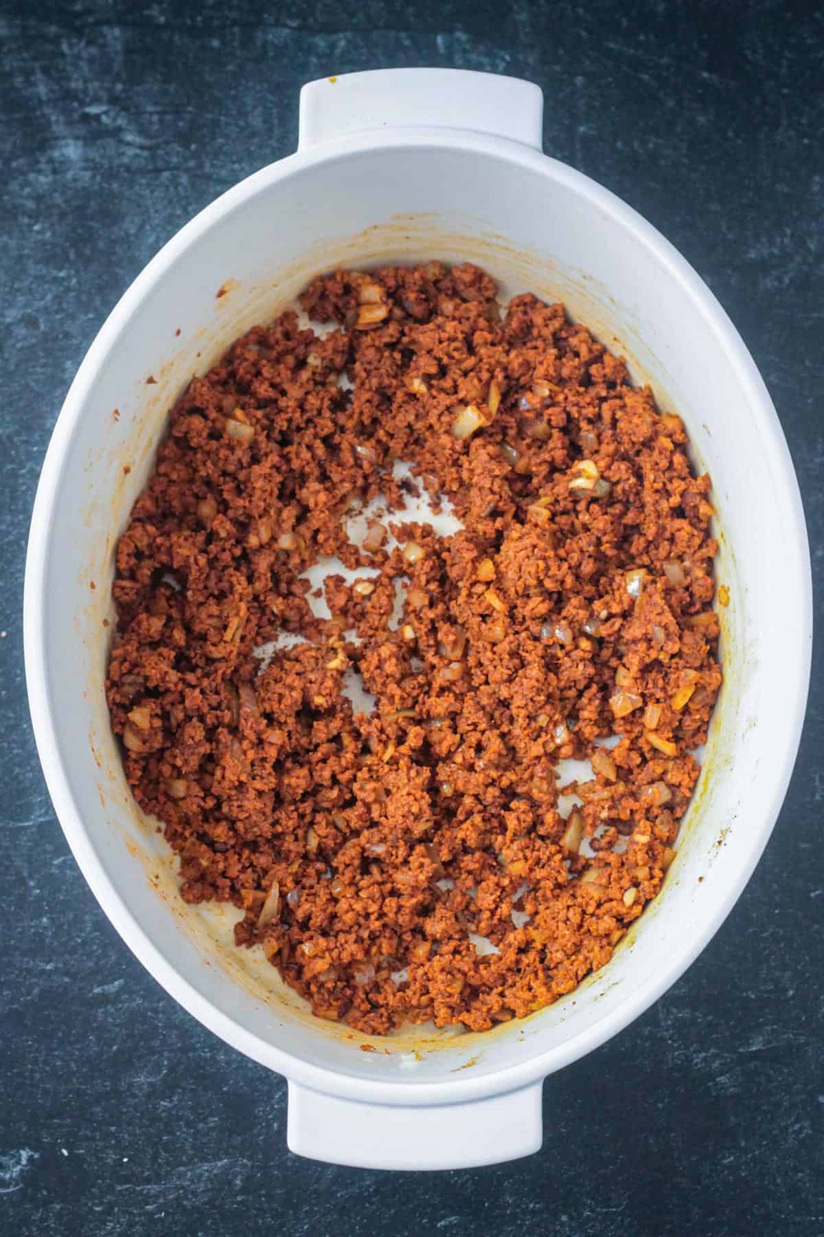 Vegan chorizo crumbled in a pot with spices.