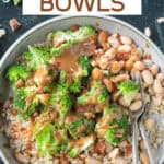 Brown rice broccoli bowls topped with almond sauce and toasted almonds.