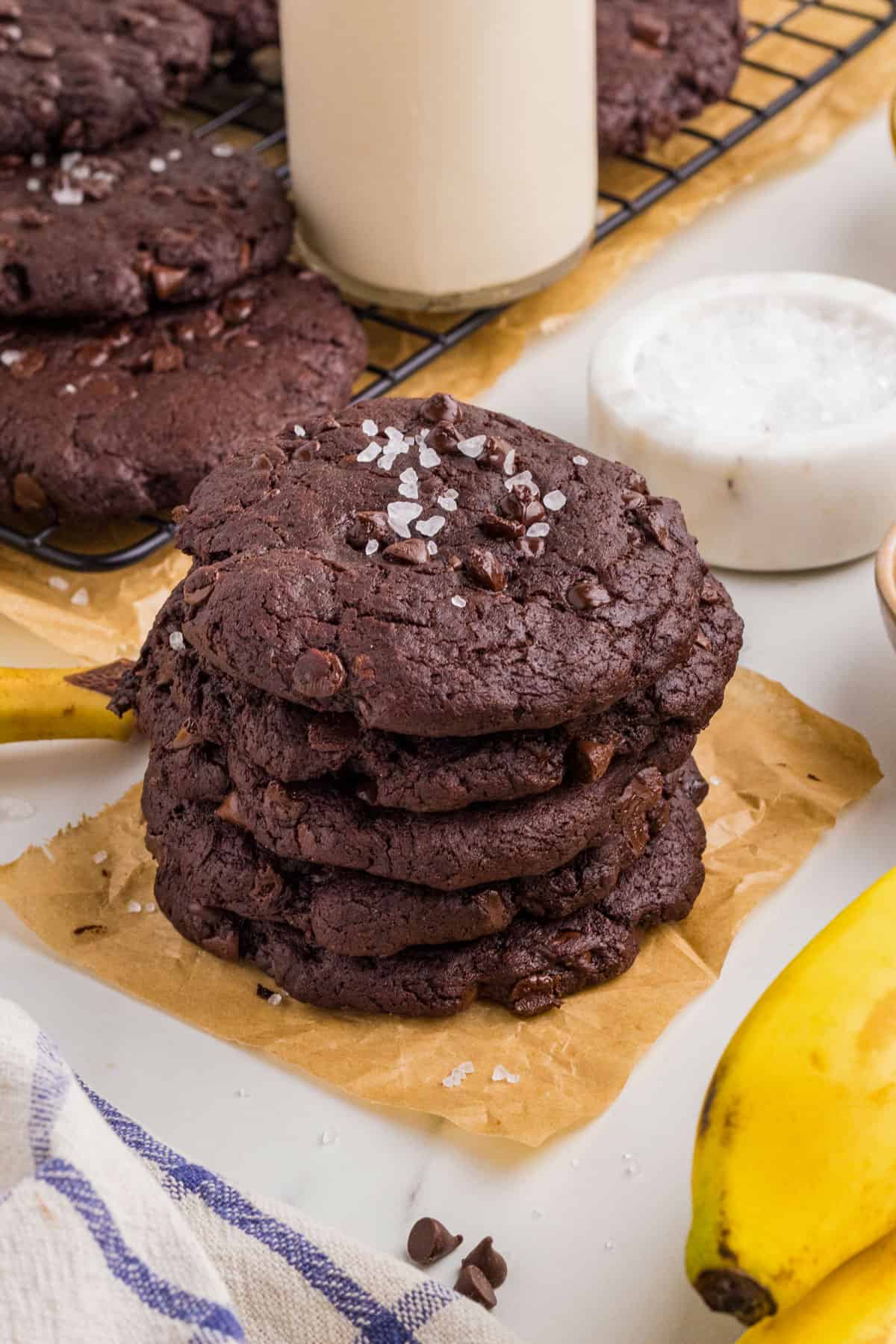 Stack of cookies on a piece of parchment paper.